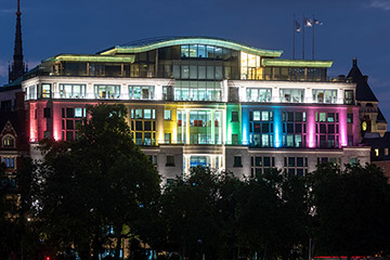 London HQ lit up in Pride flag colours